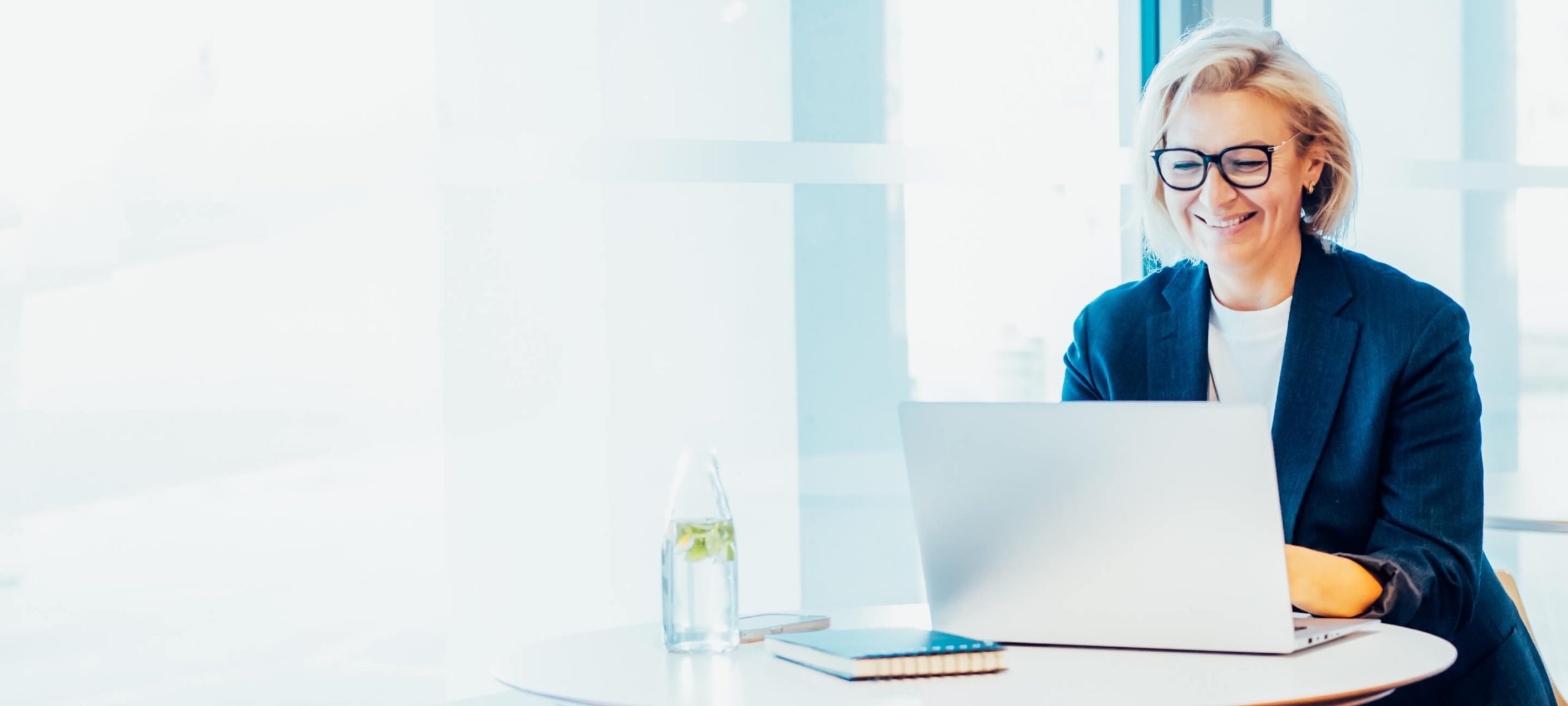 Woman using a laptop for a telemedicine appointment